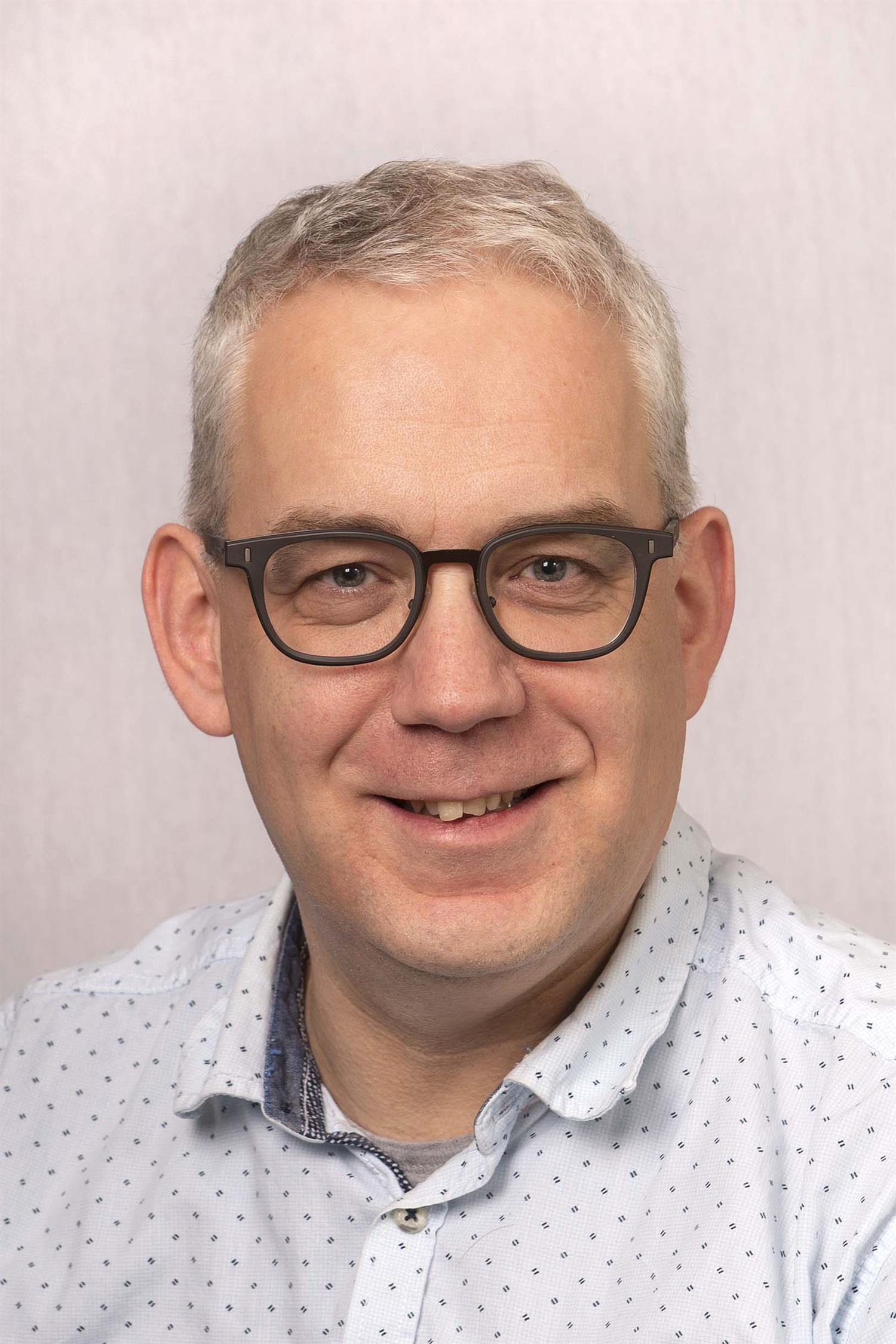 Elfrink, de heer R.J.M.